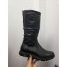 BOTA ALTA DE PIEL CON ELÁSTICO NEGRO RESISTENTE AL AGUA