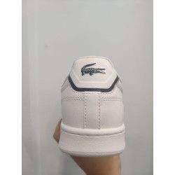 Deportiva de Piel Blanca con Línea Azul en el Contrafuerte – Estilo y Comodidad