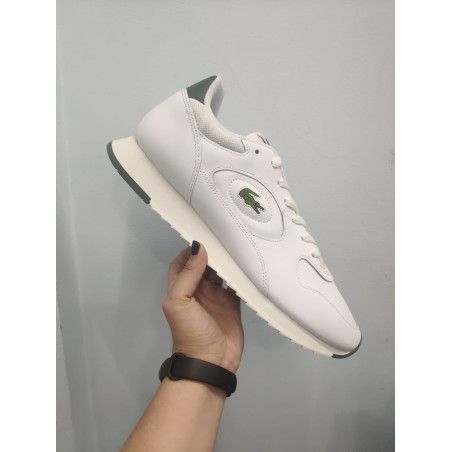 Zapatilla Blanca con Contrafuerte Verde – Comodidad y Estilo