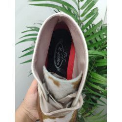 BOTÍN DE PIEL CON ESTAMPADO DE VACA