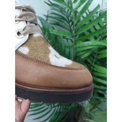 BOTÍN DE PIEL CON ESTAMPADO DE VACA